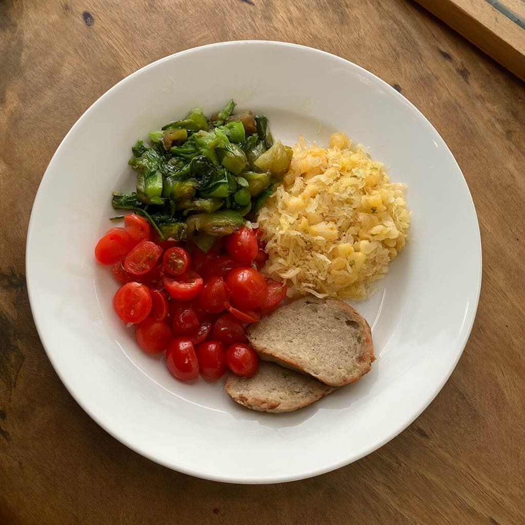 A balanced plate with vegetables and protein anchoring the meal